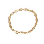 Bracciale oro giallo lucido satinato con fiorellini