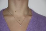 Collana oro bianco con diamanti e perla