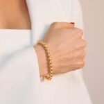 BRACCIALE CON SFERE SATINATE PLACCATO IN ORO