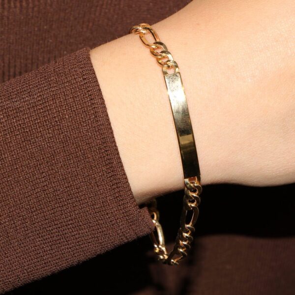 Bracciale oro giallo tre piu uno con targhetta