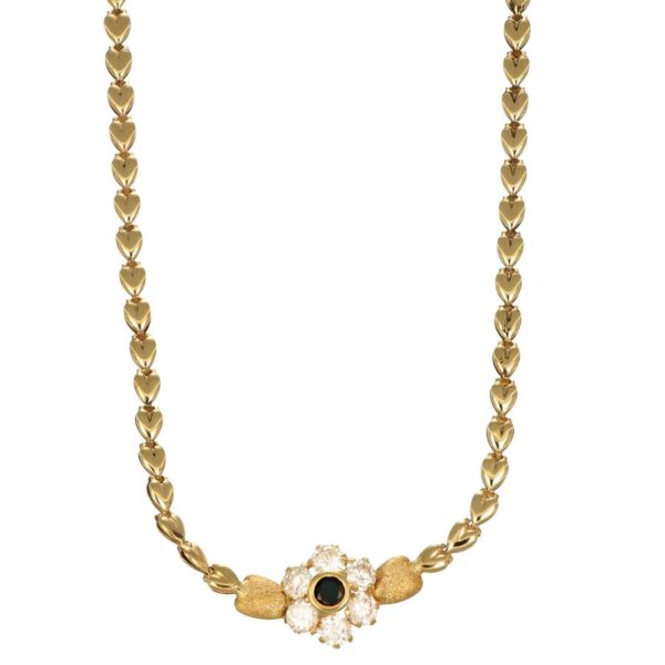 Collana oro giallo fiore centrale con zirconi blu e bianchi