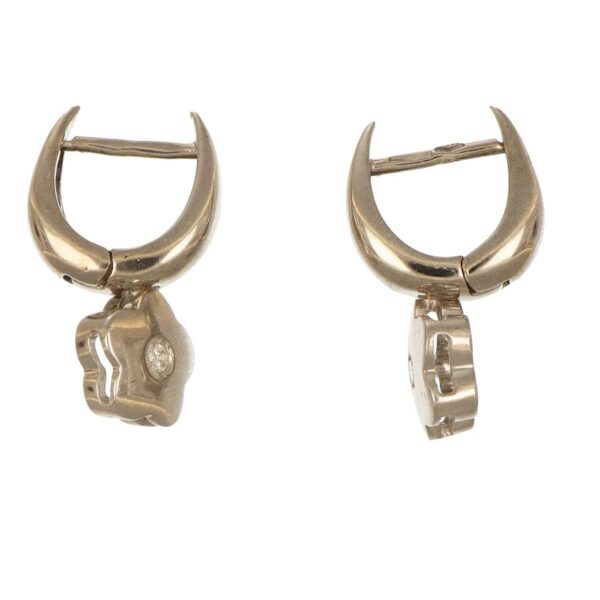 Orecchini oro bianco con fiore pendente con diamante