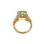 Anello due ori con zircone celeste e zirconi bianchi