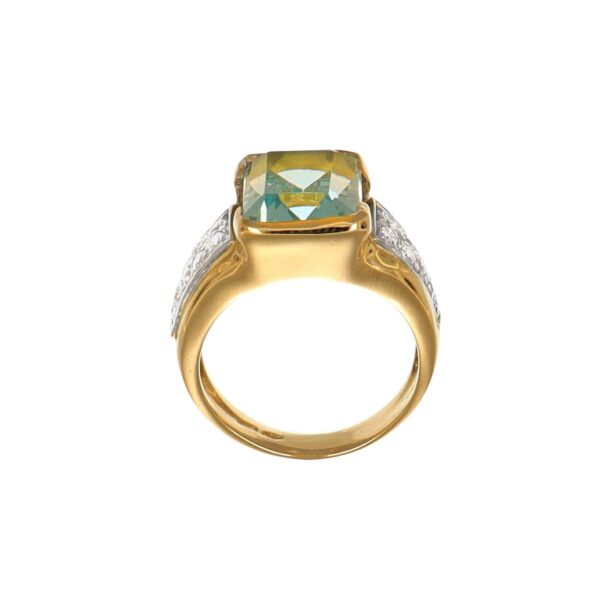 Anello due ori con zircone celeste e zirconi bianchi
