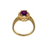 Anello oro giallo con zirconi bianchi e pietra centrale viola