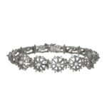 Bracciale oro bianco semirigido con zirconi modello vintage