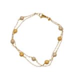 BRACCIALE DUE ORI CON SFERE