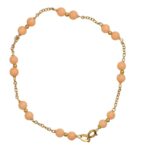 Bracciale oro giallo con corallo rosa