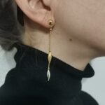 Orecchini due ori pendenti