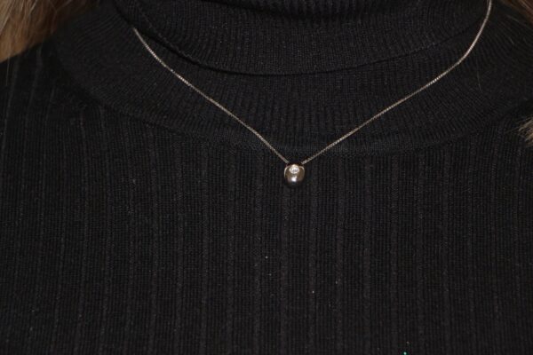 Collana oro bianco punto luce con diamante di nacci