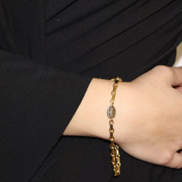 Bracciale due ori catena ovale piatta baraka