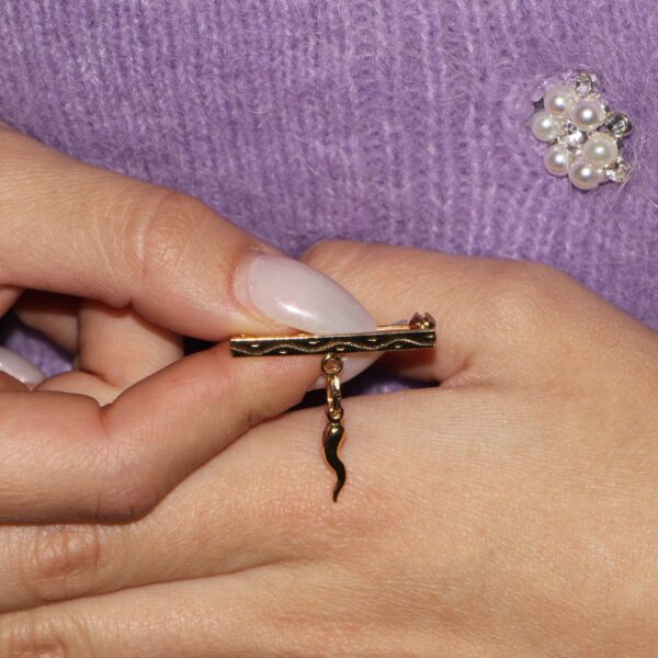 Spilla oro giallo con ciondolo cornetto