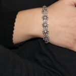 Bracciale oro bianco semirigido con zirconi modello vintage