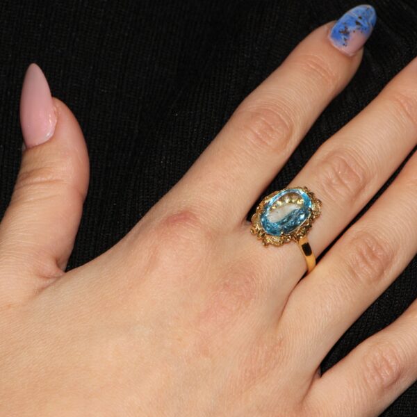 Anello oro giallo con zircone celeste