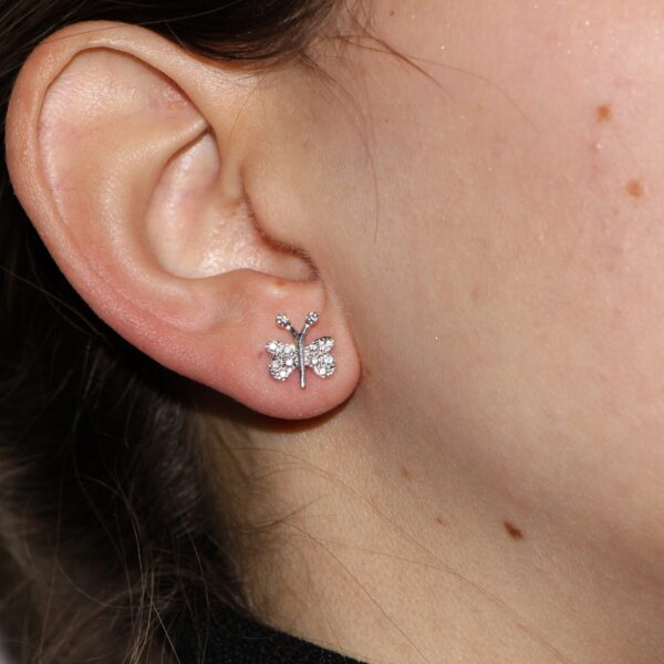 Orecchini oro bianco farfalla con zircone bianco