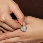 Ciondolo due ori cuore con zirconi cigarini