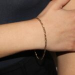 Bracciale oro giallo tre piu uno