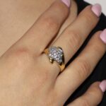 Anello due ori pavee con zirconi bianchi