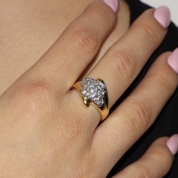 Anello due ori pavee con zirconi bianchi