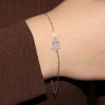 Bracciale oro bianco con stella con zirconi bianchi