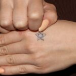 Ciondolo oro bianco stella con zirconi bianchi
