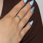 Anello oro giallo riviera con zirconi bianchi