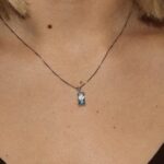 Collana oro bianco con zircone celeste e bianco gold planet
