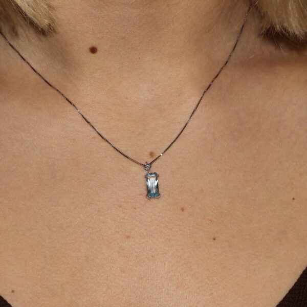 Collana oro bianco con zircone celeste e bianco gold planet