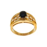 ANELLO ORO GIALLO CON ZAFFIRO BLU TAGLIO OVALE KT 1.20 E DIAMANTI KT 0.05X6+0.07X2 G VS1