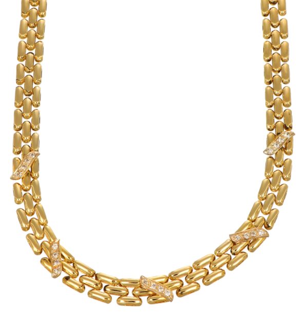 COLLANA ORO GIALLO SEMIRIGIDA CON ZIRCONI BIANCHI