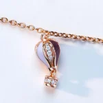 Rosato collana catena Aria argento 925 con ciondolo mongolfiera zirconi bianchi oro rosa