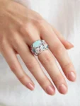 ANELLO ORO BIANCO CON PIETRE SEMIPREZIOSE ZIRCONI ROSA E CELESTI
