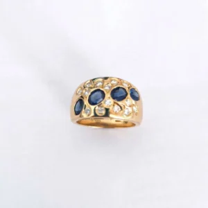 ANELLO ORO GIALLO FASCIA CON DIAMANTI E ZAFFIRI BLU CARATI TOT. 0.28