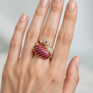 anello due ori cigno con diamanti kt 0.70 f/g si i1 e rubini taglio cushon kt rubini kt 1.83