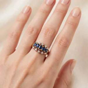anello oro giallo 375 con zaff blu taglio ovale kt 0.60 e diamanti kt 0.25+0.02 h/i vs