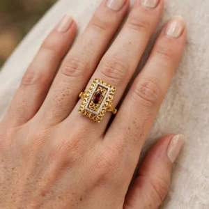 anello due ori con zircone rosso