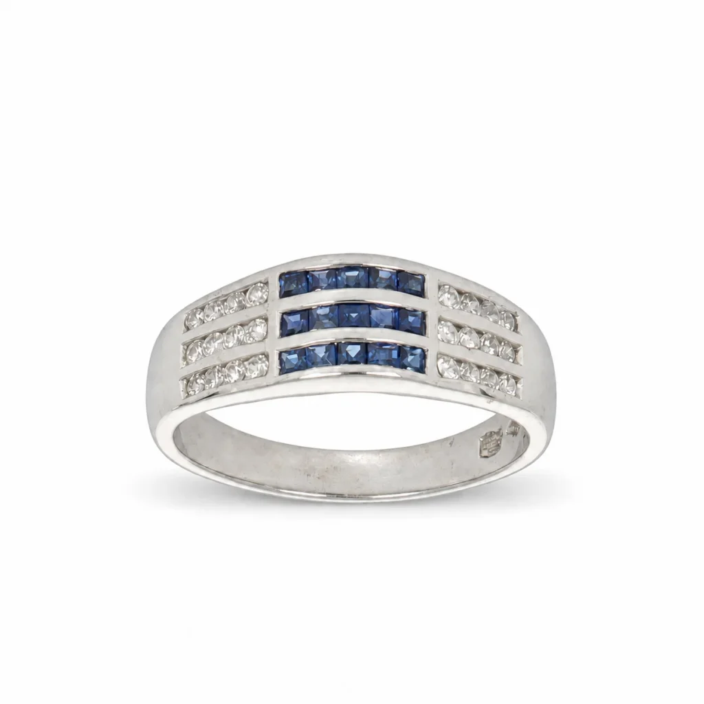Anello a fascia in oro bianco 18 kt con file di zirconi blu e bianchi