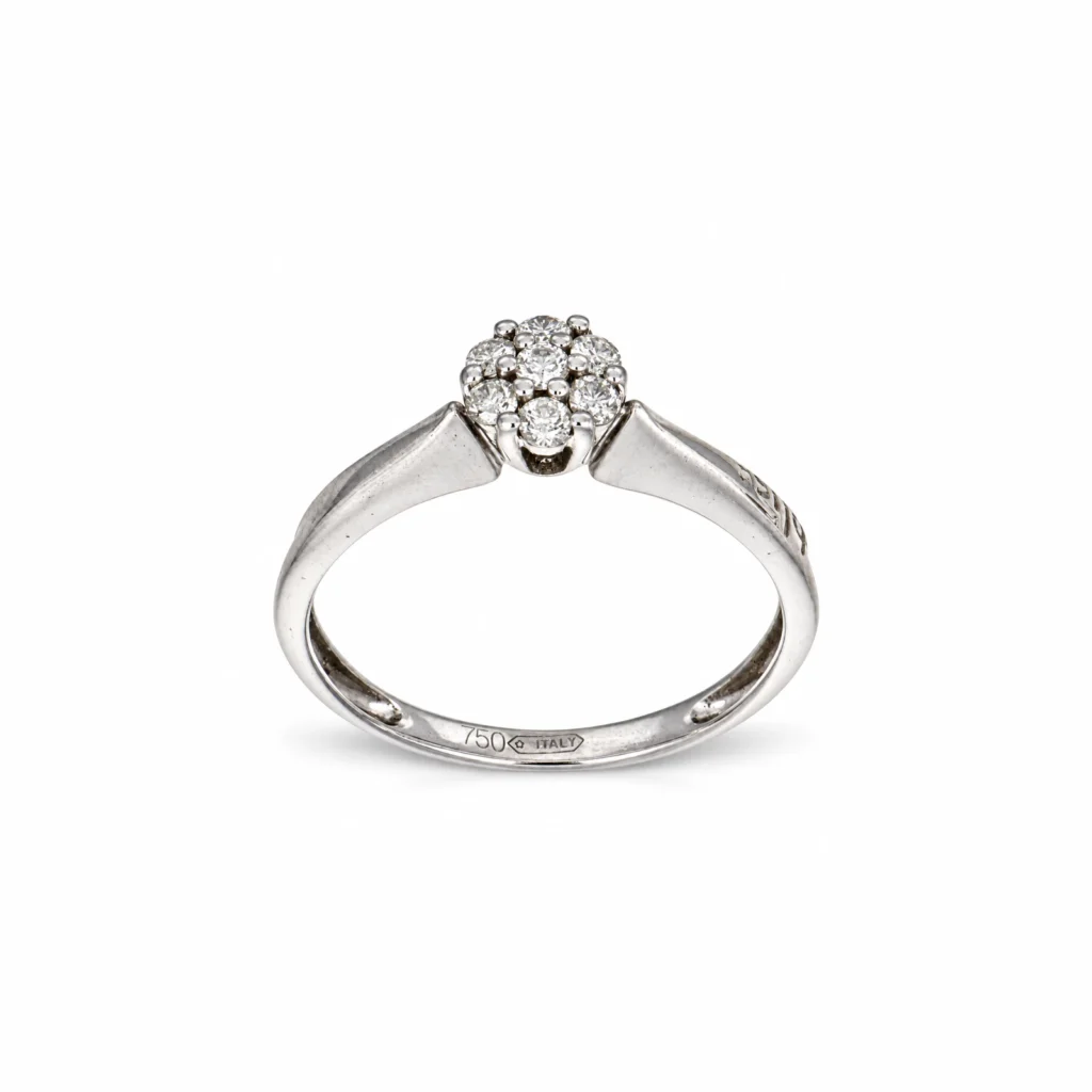 Anello Magic in oro bianco 18 kt con sette diamanti disposti a fiore al centro