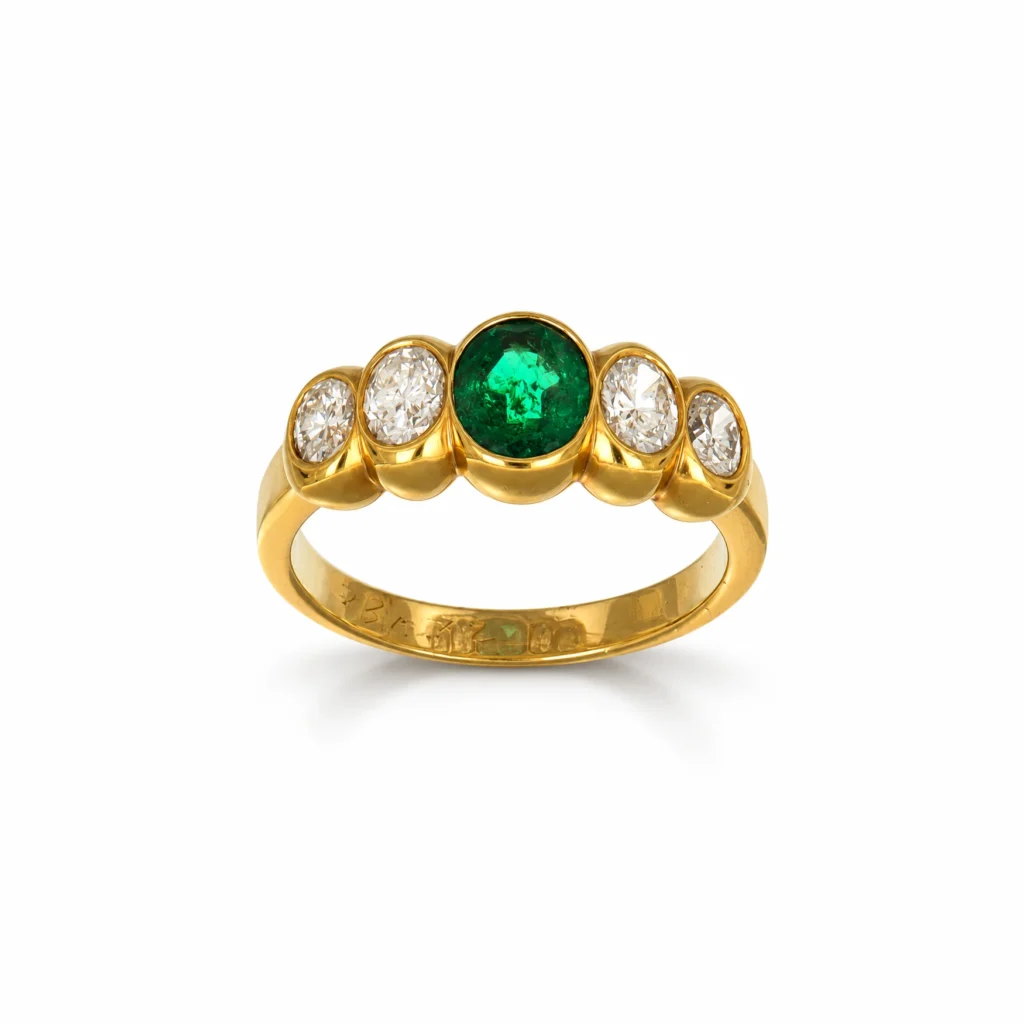 Anello oro giallo con smeraldo e diamanti