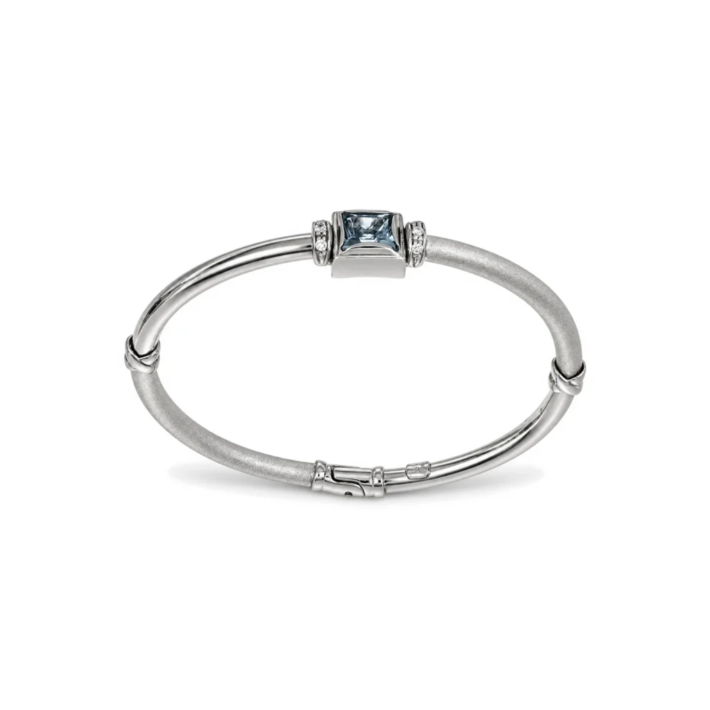 Bracciale oro bianco rigico con zircone celeste e bianchi lucido satinato, oro 18 kt