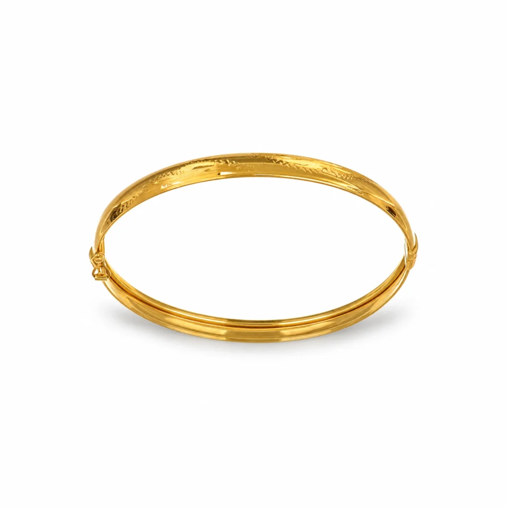 Bracciale rigido in oro giallo 18 kt lucido e satinato, lunghezza 5,7 cm