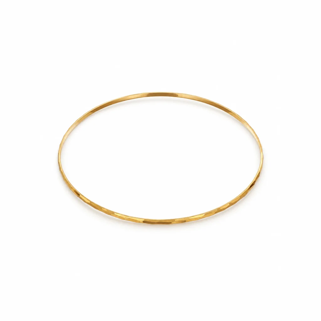 Bracciale oro giallo rigido tondo lavorato sottile, oro 18 kt, lunghezza 7 cm
