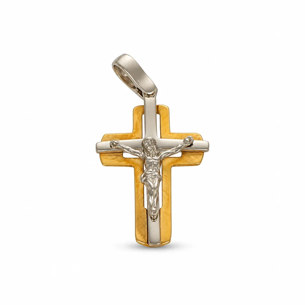Crocifisso bicolore in oro giallo e bianco 18 kt con figura di Gesù in rilievo